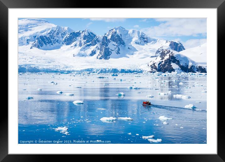 Zodiac going out to explore Antarctica Framed Mounted Print by Sebastien Greber