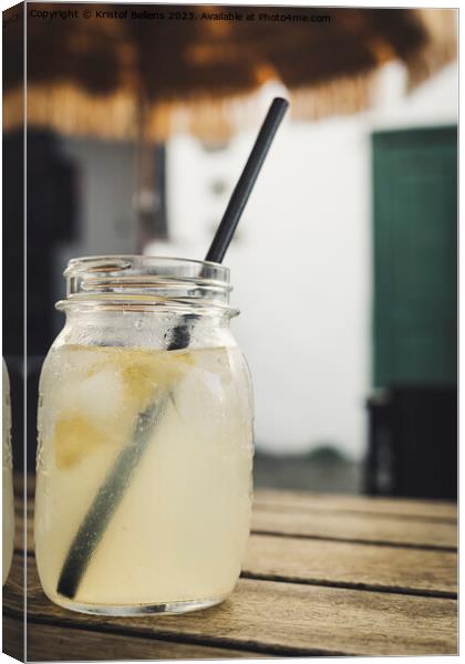 Vertical shot of a jar with homemade lemon lemonade Canvas Print by Kristof Bellens