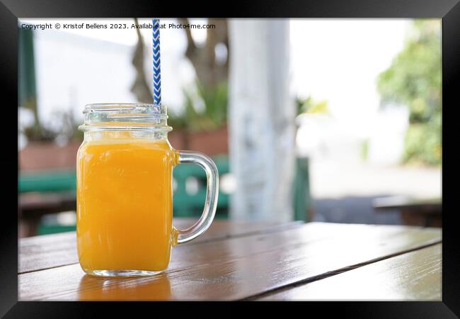 Horizontal shot of a jar of homemade orange juice Framed Print by Kristof Bellens