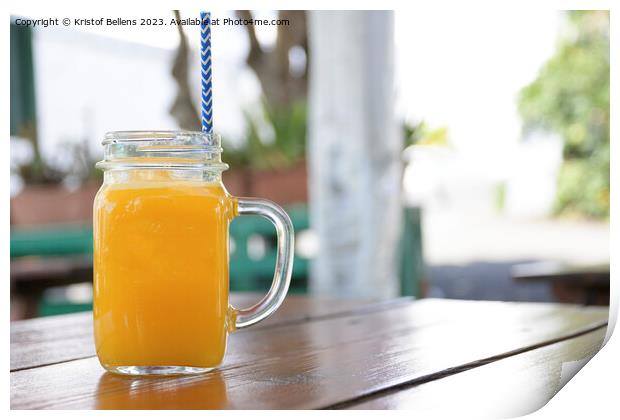 Horizontal shot of a jar of homemade orange juice Print by Kristof Bellens