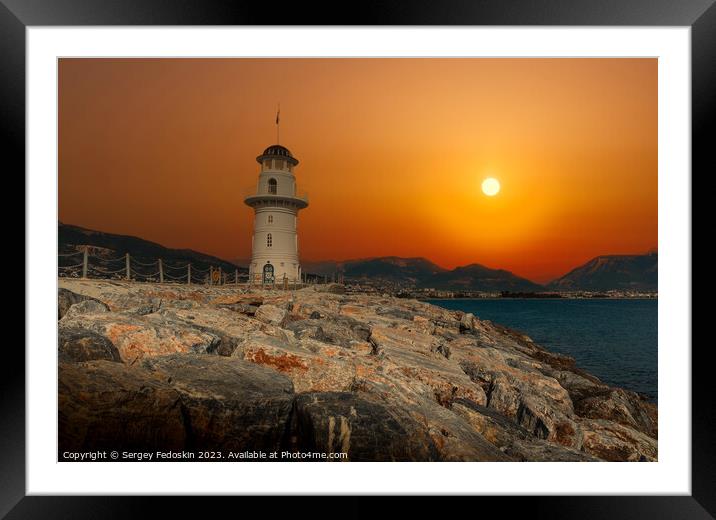 Lighthouse at sunset. Framed Mounted Print by Sergey Fedoskin