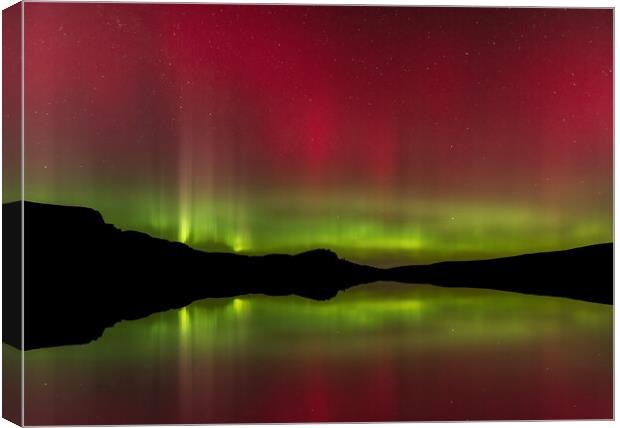 The Northern Lights reflected in Loch Fada Canvas Print by Kevin Winter