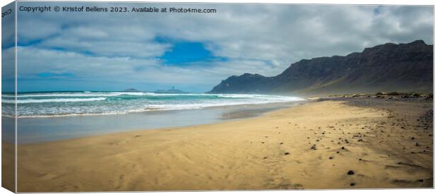 View on Famara beach on the Canary Island of Lanzarote, with some windsurfing in the far distance Canvas Print by Kristof Bellens