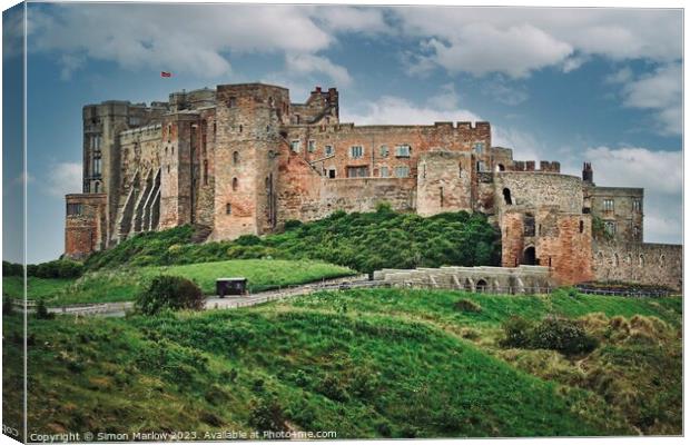 Majestic Bamburgh Castle Canvas Print by Simon Marlow