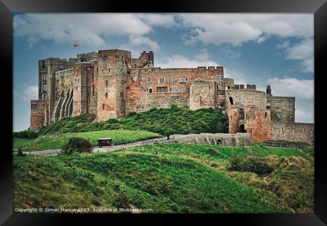 Majestic Bamburgh Castle Framed Print by Simon Marlow