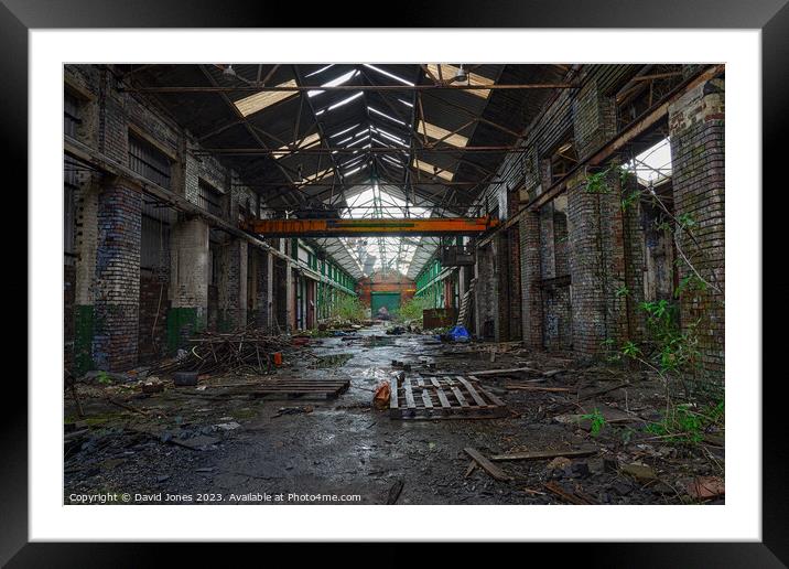 Abandoned warehouse with overhead crane Framed Mounted Print by David Jones