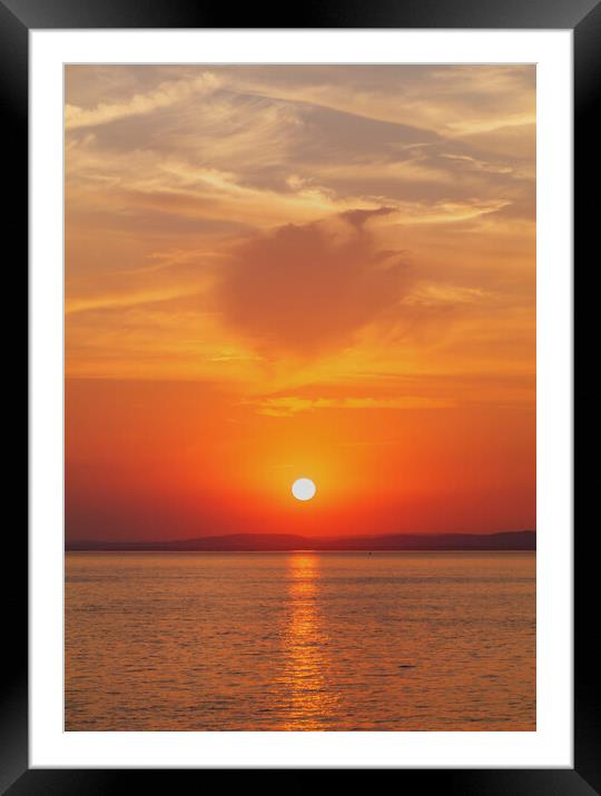 Streak of sunlight going across the Bristol channel Framed Mounted Print by Rory Hailes