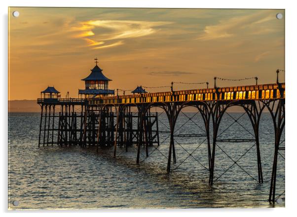 Clevedon Pier at sunset and sunlight reflecting onto the side panels Acrylic by Rory Hailes