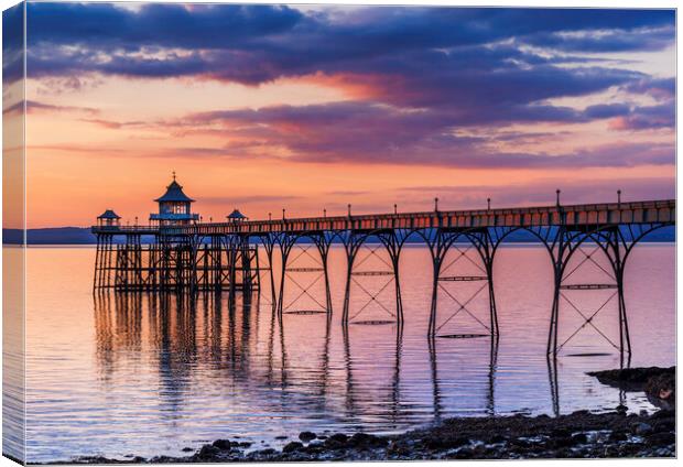 Clevedon Pier at Sunset with a slight pinkish hue Canvas Print by Rory Hailes