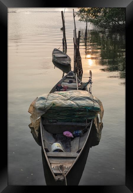 Canoes at sunset Framed Print by Jed Pearson