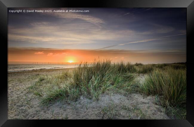 Peaceful Sunrise on Caister Beach Framed Print by David Powley