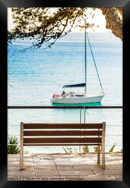 Idyllic view of sailboat Framed Print by Alex Winter