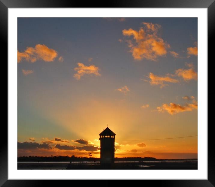 Brightlingsea sunsetting behind Batemans Tower in full colour  Framed Mounted Print by Tony lopez
