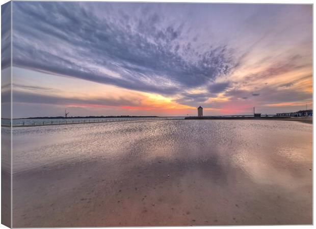 Sunset cloudscape and colours over the Brightlingsea tidal pool and Batemans Tower.  Canvas Print by Tony lopez