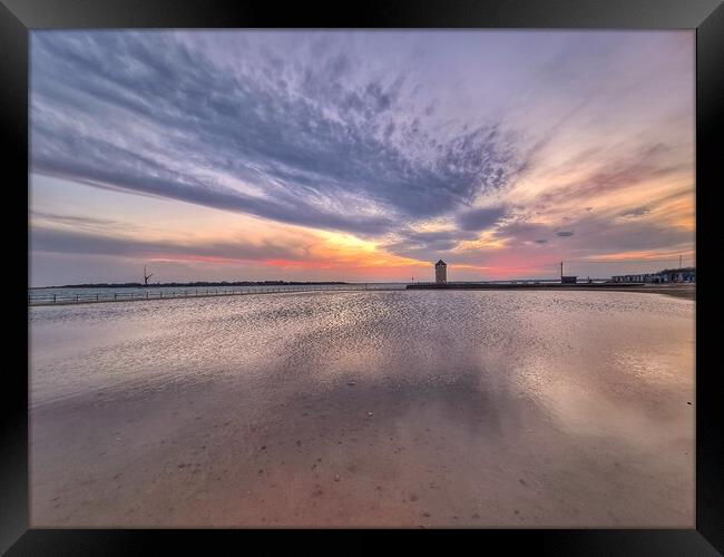 Sunset cloudscape and colours over the Brightlingsea tidal pool and Batemans Tower.  Framed Print by Tony lopez