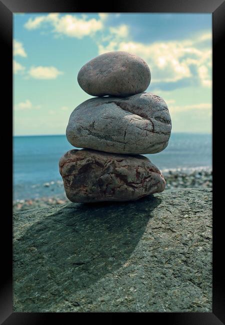 Small stone stack on beach Framed Print by Michael Hopes