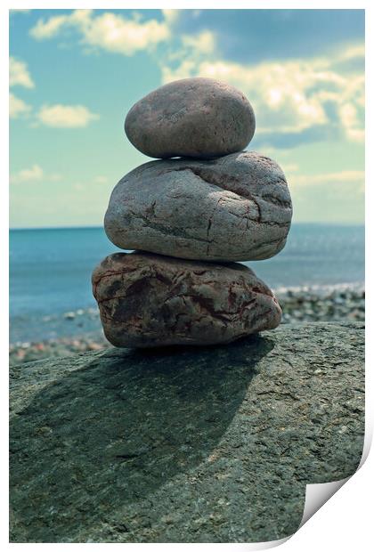 Small stone stack on beach Print by Michael Hopes