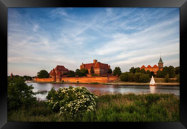The Malbork Castle in Poland Framed Print by Artur Bogacki