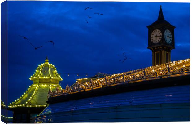 Brighton Pier At Night Canvas Print by Chris Lord