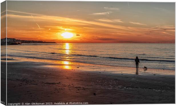 Walk along the beach at sunset Canvas Print by Alan Glicksman