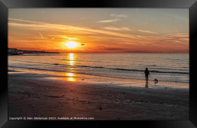 Walk along the beach at sunset Framed Print by Alan Glicksman