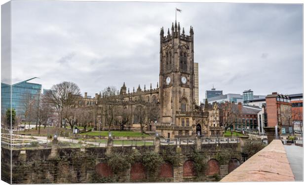 Manchester Cathedral on the River Irwell Canvas Print by Jason Wells