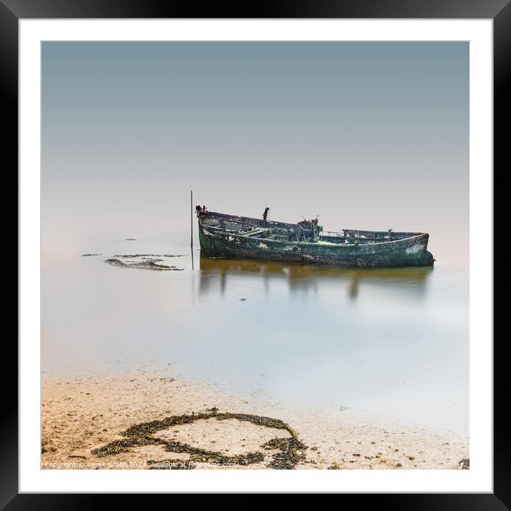 A boat lies waiting Framed Mounted Print by Derek Griffin