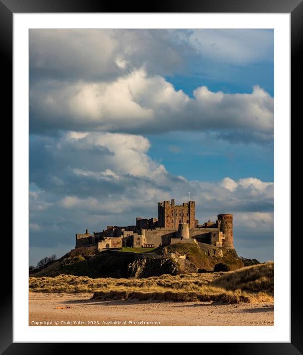 Bamburgh Castle At Sunset Framed Mounted Print by Craig Yates