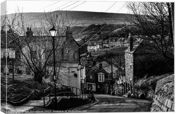Descent into Robin Hoods Bay Canvas Print by Ian Donaldson