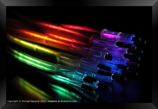 Some fibre optic cables glowing at the end in different colors a Framed Print by Michael Piepgras