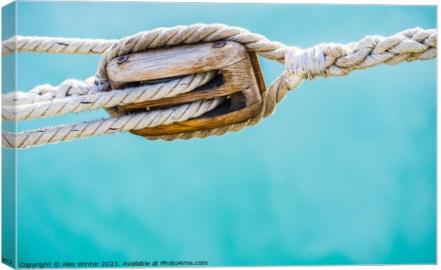 Pulley with ropes of a classic sailing boat. Nauti Canvas Print by Alex Winter