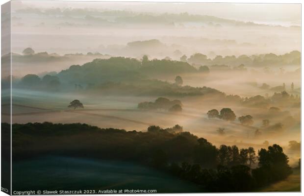 Mist in the Valley Canvas Print by Slawek Staszczuk