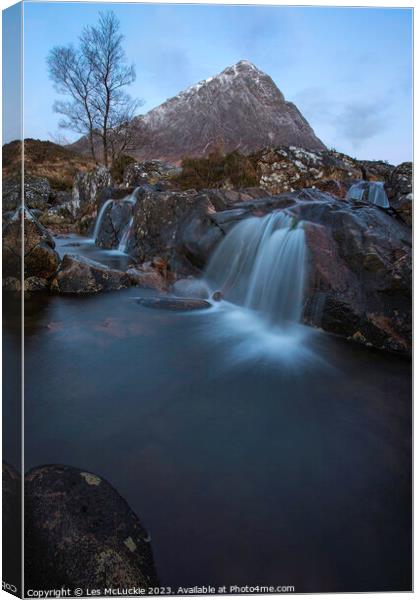 Majestic Waterfall in Glen Coe Canvas Print by Les McLuckie