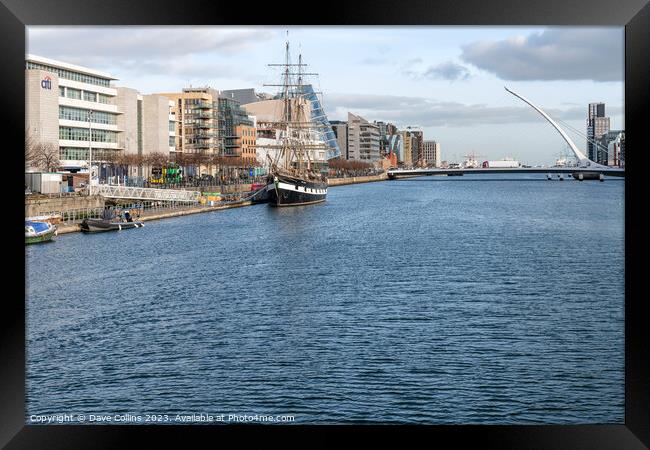 Tall Ship replica, Jeanie Johnston moored on the River Liffey and the river front buildings, Dublin, Ireland Framed Print by Dave Collins