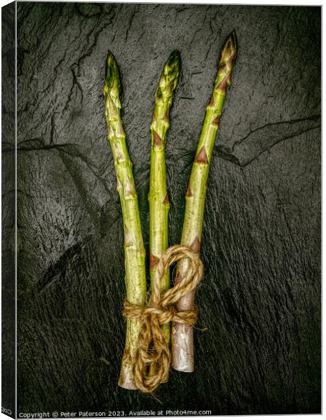 Asparagus Stalks on Slate Canvas Print by Peter Paterson