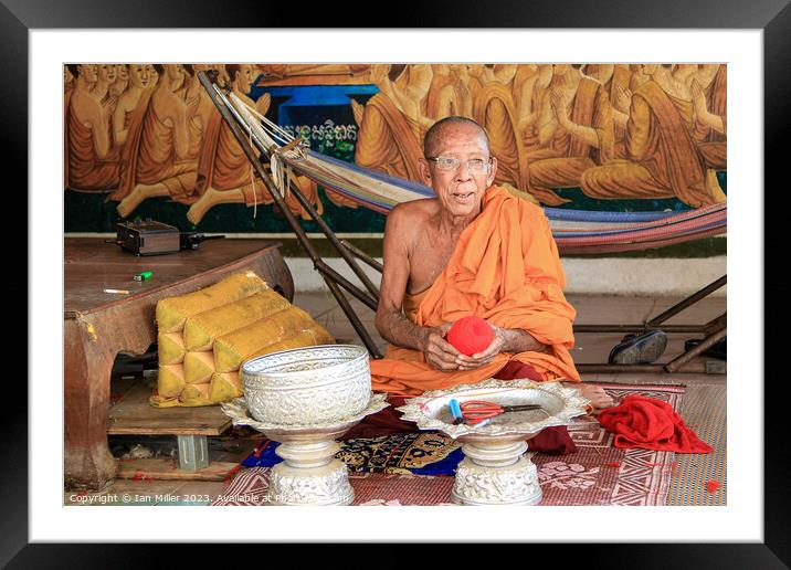 Monk in Cambodia Framed Mounted Print by Ian Miller