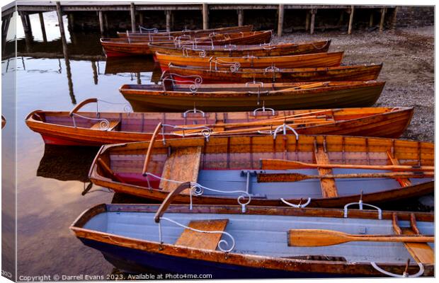 Boats in a row Canvas Print by Darrell Evans