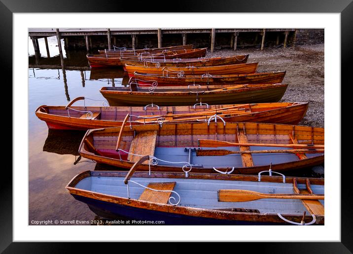 Boats in a row Framed Mounted Print by Darrell Evans