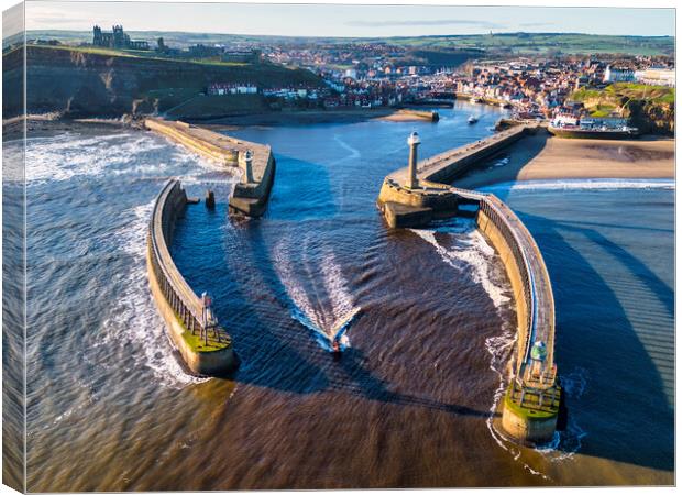 Boat leaves Whitby Harbour Canvas Print by Tim Hill