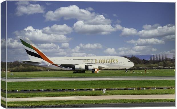 Emirates getting ready for take off Canvas Print by simon cowan