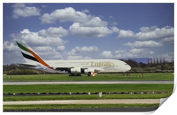 Emirates getting ready for take off Print by simon cowan