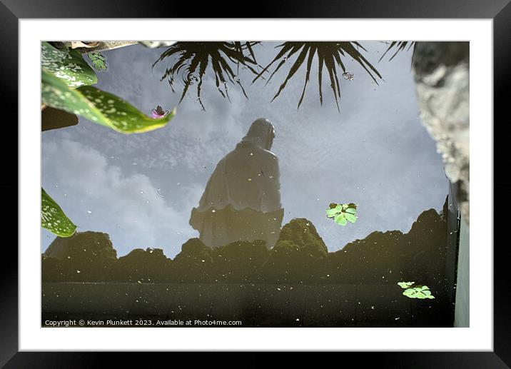 Image of Buddha Statue reflected from Water Framed Mounted Print by Kevin Plunkett