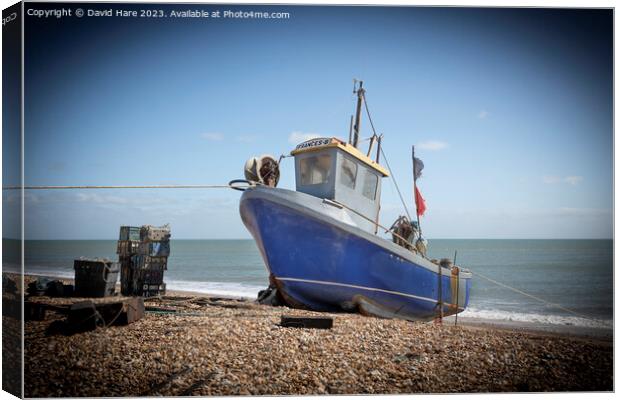 Small Blue Fishing Boat Canvas Print by David Hare