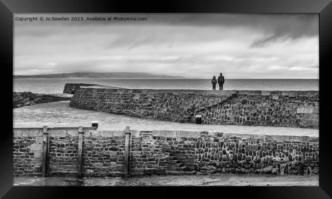 Enjoying the view from the Cobb, Lyme Regis Framed Print by Jo Sowden