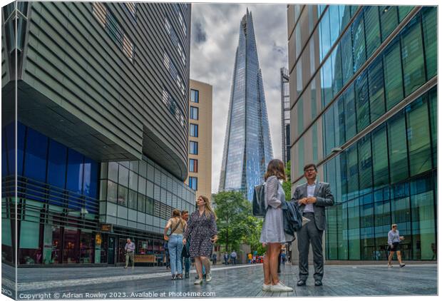 Life in The City under The Shard Canvas Print by Adrian Rowley