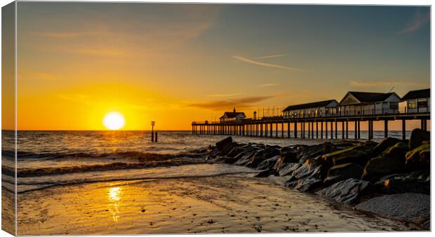 Sunrise at Southwold Pier Canvas Print by Mike Johnson