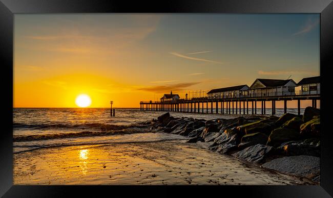 Sunrise at Southwold Pier Framed Print by Mike Johnson