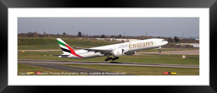 Emirates Boeing 777 taking off from Birmingham Framed Mounted Print by Stephen Thomas Photography 