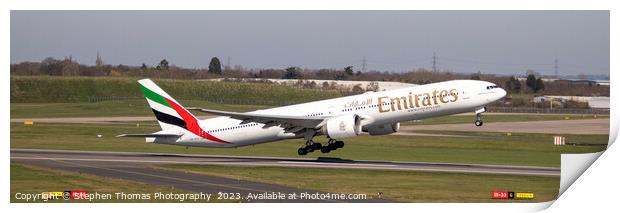 Emirates Boeing 777 taking off from Birmingham Print by Stephen Thomas Photography 