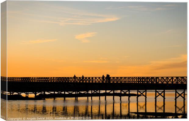 Wooden bridge welcoming twilight Canvas Print by Angelo DeVal